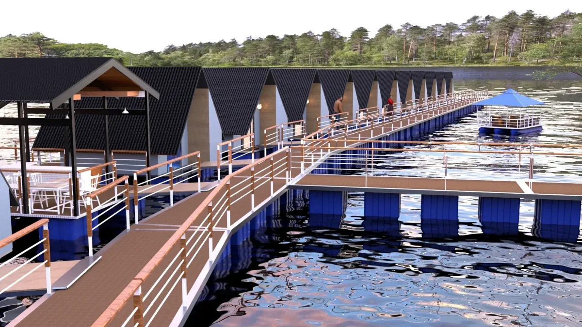 Titian apung berpagar panjang menuju deretan cottage dengan perahu beratap biru di kejauhan