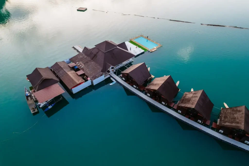 An aerial view of a floating house in the ocean