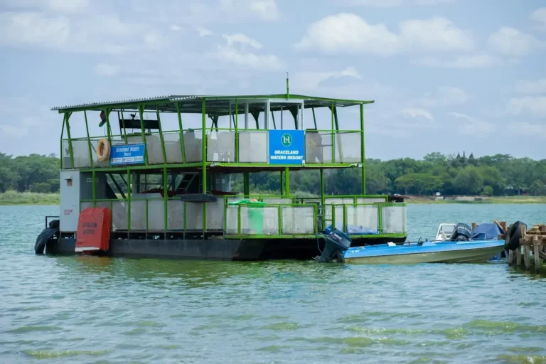a large boat floating on top of a body of water